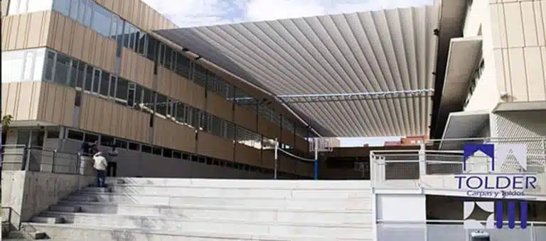 Toldos planos motorizados colegio Newman Tolder